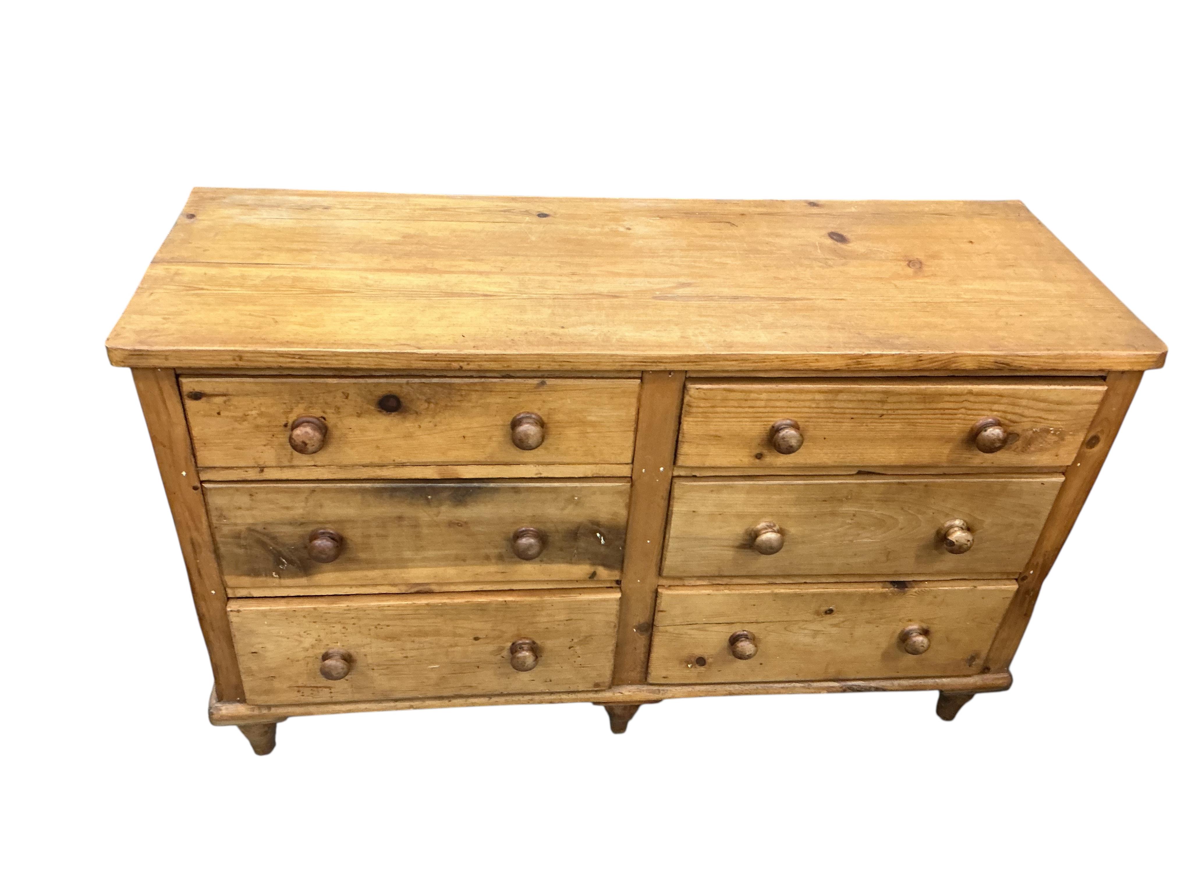 A late Victorian pine six drawer low dresser, width 132cm, depth 47cm, height 82cm
